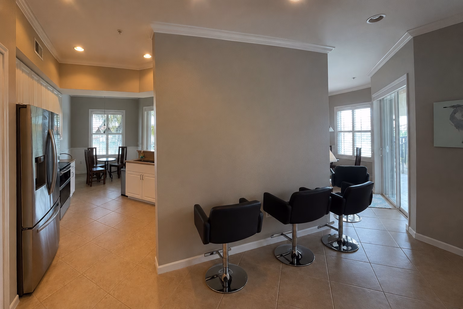 Kitchen before the BFM Builders remodel, with a wall between the kitchen and living area